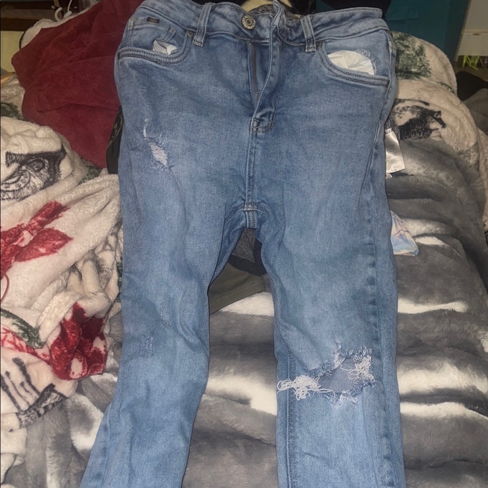 Distressed Blue Denim Jeans